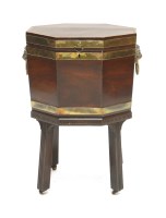 Lot 67 - A George III mahogany octagonal brass bound wine cooler