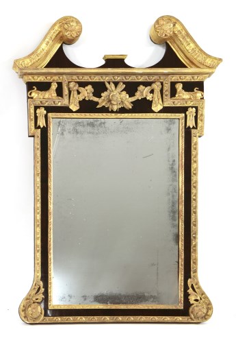 Lot 66 - A George III mahogany and parcel gilt wall mirror