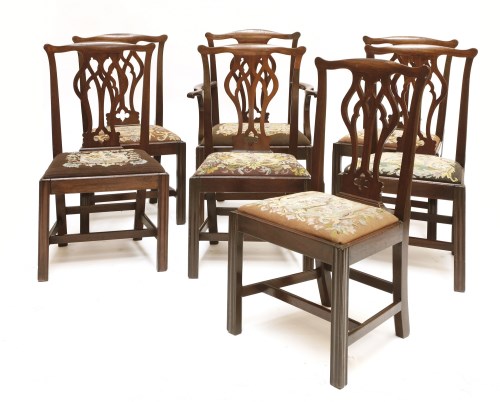 Lot 64 - A set of eight Chippendale-style mahogany dining chairs