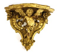 Lot 70 - A carved giltwood wall bracket