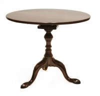Lot 125 - A mahogany tripod table