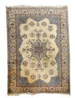Lot 129 - A Turkish carpet