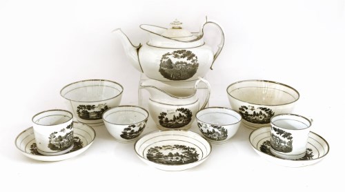 Lot 91 - A Staffordshire porcelain bat-printed and silver lustre part tea service