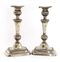 Lot 382 - A pair of old Sheffield plate candlesticks