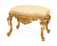 Lot 195 - A Continental carved giltwood footstool