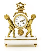 Lot 193 - A French white marble and gilt spelter mantel clock