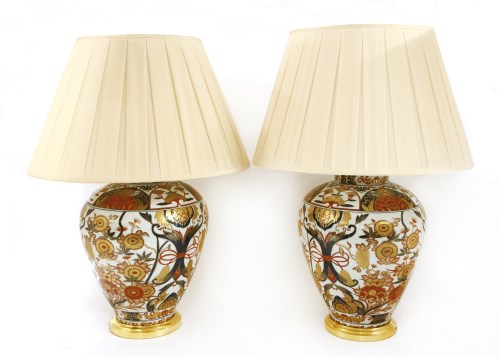 Lot 191 - A pair of Imari vase lamps