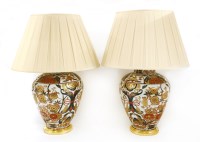 Lot 191 - A pair of Imari vase lamps