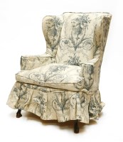 Lot 424 - A George III-style wing armchair