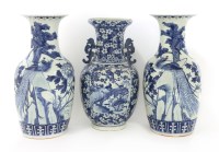 Lot 412 - A pair of Chinese blue and white baluster vases