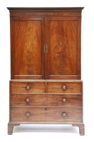 Lot 503 - A George III mahogany press cupboard