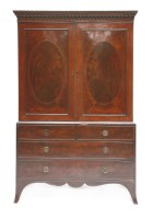 Lot 502 - A George III strung mahogany linen press