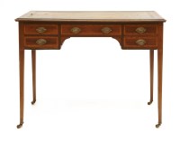 Lot 513 - An Edwardian strung and crossbanded mahogany writing table