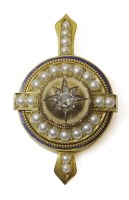 Lot 304 - A Victorian gold diamond and pearl shield form locket pendant