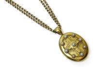 Lot 325 - A Victorian gold split pearl oval hinge locket