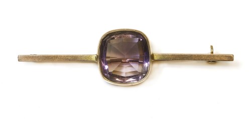 Lot 314 - An Edwardian gold single stone amethyst bar brooch