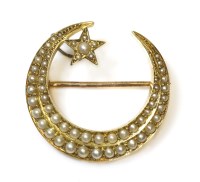 Lot 302 - A Victorian gold split pearl crescent and star brooch