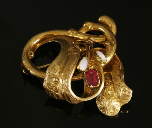 Lot 38 - A Victorian gold garnet-topped doublet and opal spray brooch