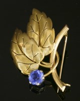 Lot 175 - A gold and blue paste stone leaf brooch