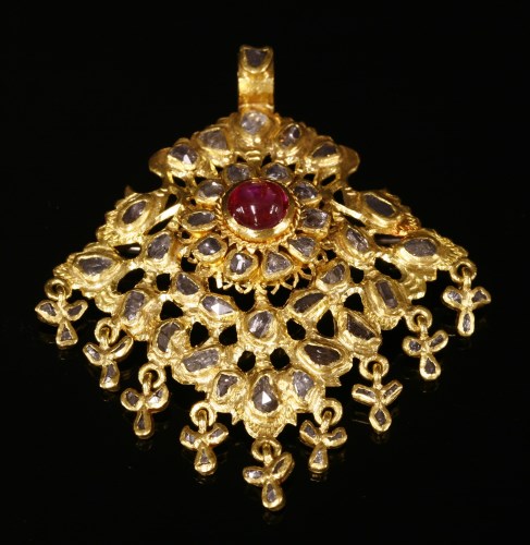 Lot 153 - An Indian high carat gold, ruby and diamond pendant