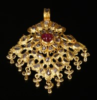 Lot 153 - An Indian high carat gold, ruby and diamond pendant