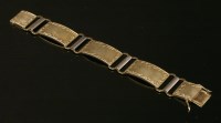 Lot 181 - A Continental Art Deco two colour gold hollow plaque link bracelet