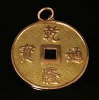 Lot 189 - An Asian gold cash coin pendant