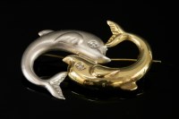 Lot 566 - A Continental two colour gold dolphin brooch
