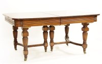 Lot 631 - A French mahogany extending dining table