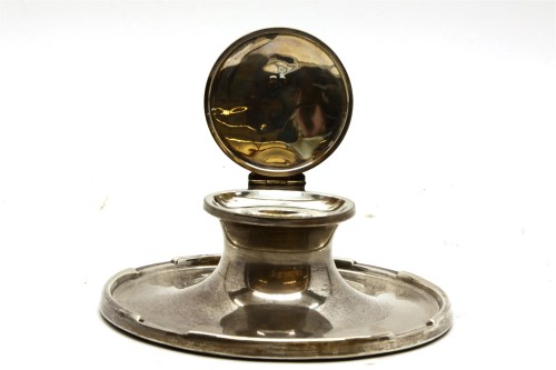 Lot 197 - A silver capstan inkwell