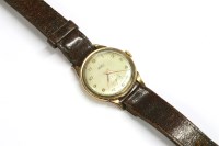Lot 55 - A gentlemen's 9ct gold Trebex mechanical strap watch