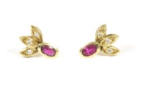 Lot 94 - A pair of gold ruby and diamond spray stud earrings