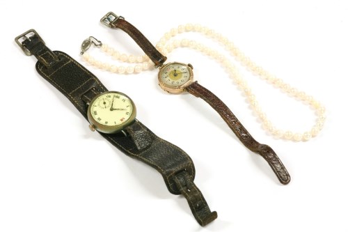 Lot 90 - A 9ct gold Afra mechanical strap watch