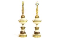 Lot 509 - A pair of American style brass and enamel electric lamps