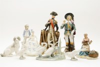 Lot 461 - A collection of Lladro and other similar china figures