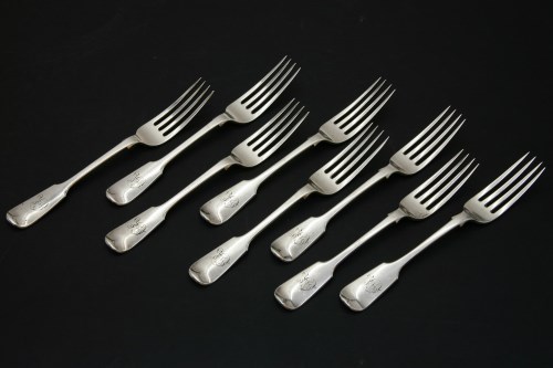 Lot 139 - Two similar sets of four hallmarked silver table forks