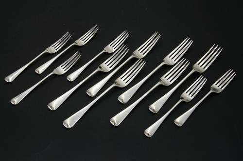 Lot 152 - A set of six silver table forks