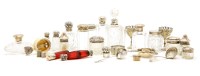 Lot 148 - Twelve silver topped glass scent bottles