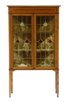 Lot 672 - An Edwardian mahogany and crossbanded display cabinet