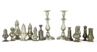 Lot 334 - A collection of pewter spice pots and castors