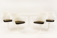 Lot 573 - An Eero Saarinen for Knoll Studio tulip dining table and four chairs
