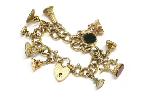 Lot 59 - A 9ct gold curb link charm bracelet with padlock
