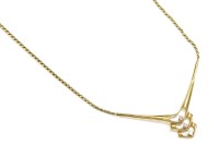 Lot 16 - A 9ct gold necklace with diamond set 'V' shaped centrepiece