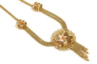 Lot 109 - A gold orange paste set centre piece and fringe necklace