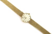 Lot 64 - A ladies 9ct gold Omega mechanical bracelet watch