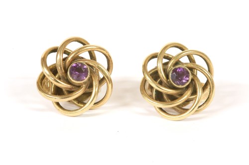 Lot 36 - A pair of 9ct gold single stone amethyst twisted knot clip on earrings