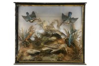 Lot 318 - A Victorian stuffed and mounted group of three snipe and four kingfishers