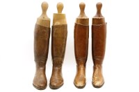 Lot 507 - Two pairs of old brown leather riding boots with wooden trees