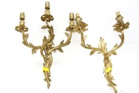 Lot 475 - A set of five bronze twin branch wall lights