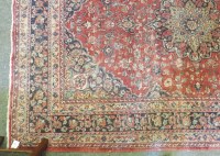 Lot 638 - A large Persian rug